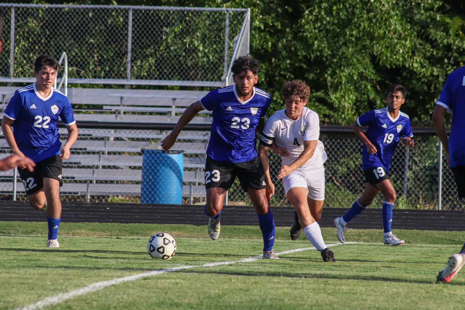 Jordan-Matthews' Juan Soto Hernandez (23) and Northwood's Walker Johnson (4) sprint toward the ball in the Jets' 4-1 season-opening win over the Chargers last Thursday in Siler City.
